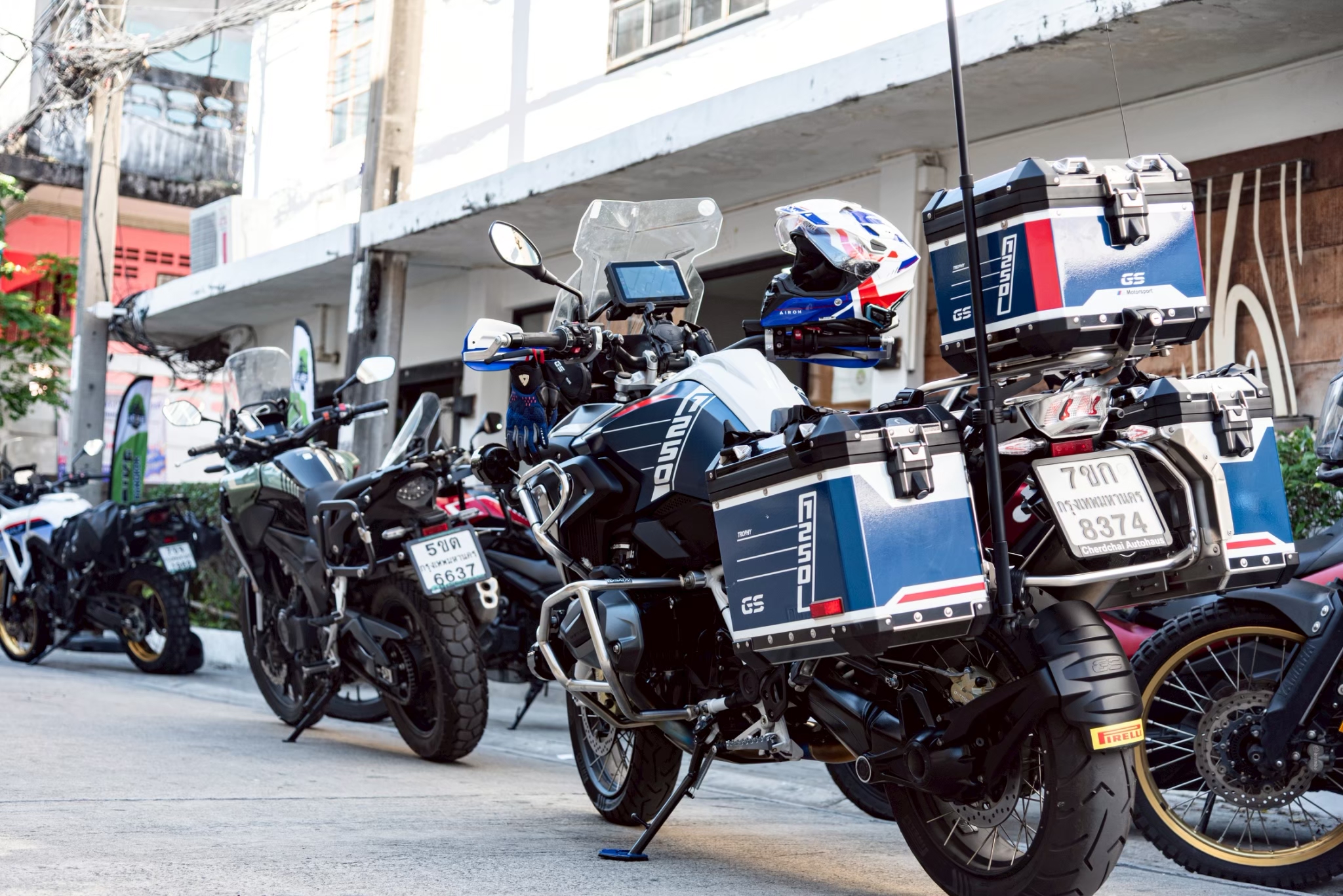 3 to 4 big bikes parked at rental shop